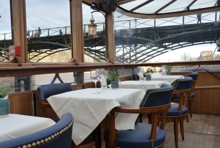 The veranda tables beneath the Pont des Arts
